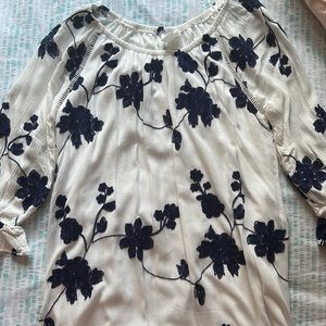 White dress with blouse flowers